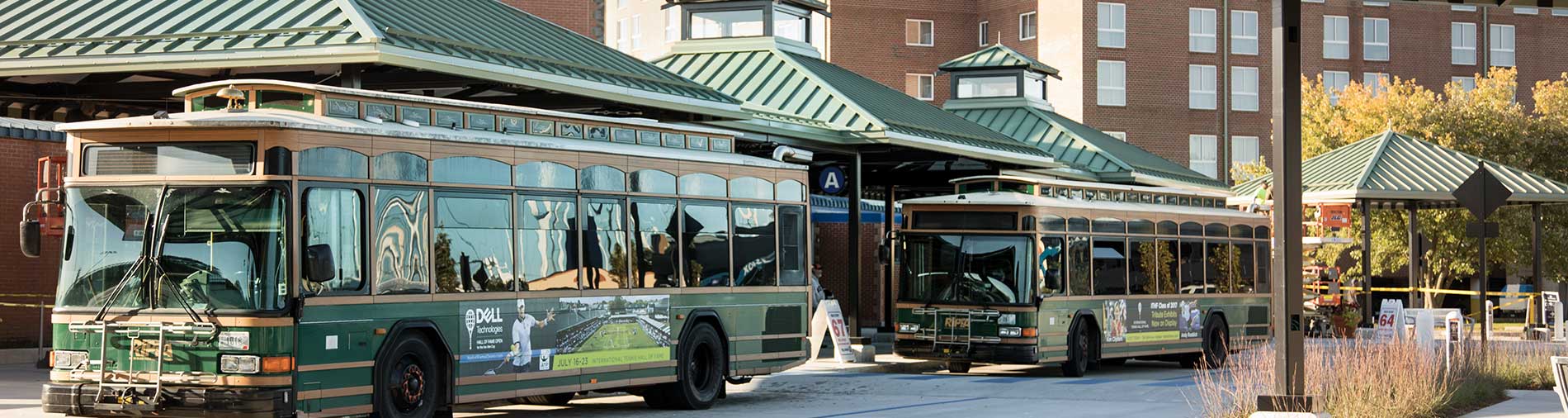 Photo of RIPTA buses, buildings and transit shelters.